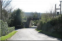 SH5371 : The road beneath the railway bridge to St Mary's Church by Eric Jones