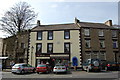 Shops alongside balcony belonging to Stanhope Castle