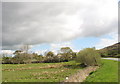 Buarth-y-clytiau seen across farmland