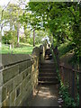 A steep footpath to the right of St Thomas