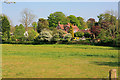 Looking across field to the backs of houses in Rectory Lane, Meonstoke