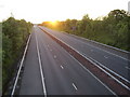 NS4371 : Sunset over an empty motorway by Stephen Sweeney