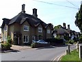 Houses opposite the church in Waresley