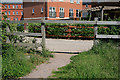 Boundary fence of Knowle development in Charity View