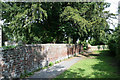 Wall alongside St. Giles Church graveyard near Tonge