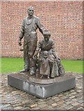 SJ3389 : The Emigrants (statue), Albert Dock, Liverpool by Humphrey Bolton