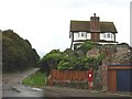 Oldstairs Road and a house on the hill