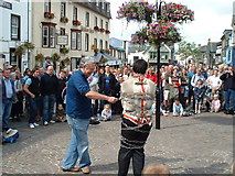 NY2623 : Escapologist entertains the crowds, Keswick by Nick Barker