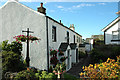 NY0830 : Attractive terrace of houses, High Brigham by Phil Davies