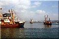 Fishing Trawlers leaving the quay at Brixham