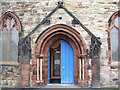 NX9928 : Porch, St Michael's Church, Workington by Alexander P Kapp