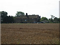 House across wheatfield near Sparrow Green