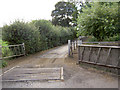 Gates to Tyers Hall farm and cattle grid.