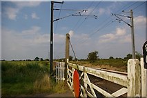 TF6009 : View down railway tracks at level crossing by Fractal Angel