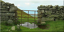 SH6220 : Flooded gate at the top of Bwlch y Rhiwgyr by Eric Jones