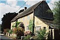 West Milton: sandstone thatched cottage