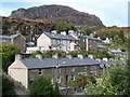 Double row of houses with mountain behind