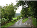 A road junction and two further gates