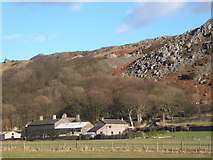SD1482 : Cluster of buildings at Po House, backed by steep woods and crags by Andrew Hill