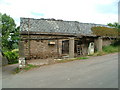 Disused petrol station at Itton Common