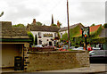 Bus stop in front of The George and Dragon.