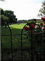 View across the fence into the cemetery on Sharrington Road