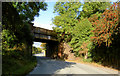 Bridge over road carrying disused colliery railway branch line.