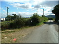 Looking down the road with footpath signs