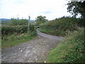 View from disused track to road