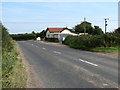 NE past house on Stepping Stone Lane (B1159)