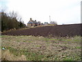 Cottages at Balintraid farm from B817 looking NW