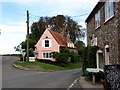 Pink cottage on junction of Hindringham Road with Warham Road