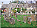 Bledington: cottages and churchyard