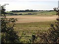 TR2851 : View across farmland from footpath junction by Nick Smith