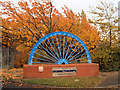 Mining wheel entrance to School