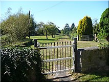 ST3883 : Gate into Whitson parish church by Robin Drayton