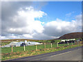 Farm buildings alongside the B4413 on the western outskirts of Mynytho