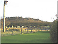 SH2227 : The crags of Mynydd y Graig viewed over the Capel Nebo graveyard by Eric Jones