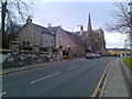 Old house and church in Dumbarton