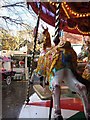 Carousel and candyfloss stall