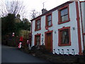 Post office, Llanychaer, with santas and snowmen