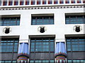 Cat frieze on Carreras building