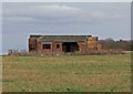 Derelict building near Ashpole Spinney