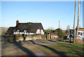 Telephone box and cottage at Prior