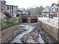 Stream bed, former leat, Exeter quay with road bridge