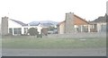 Bungalows alongside the A499 at Pontllyfni