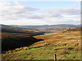 SK0693 : Hurst Brook & Reservoir with Glossop in the background by Rhys Thomas