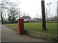 Unusually cuboid post box