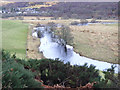 Flooded river, with Rogart in distance