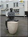 Boatman sculpture in bronze and stone by Andre Wallace